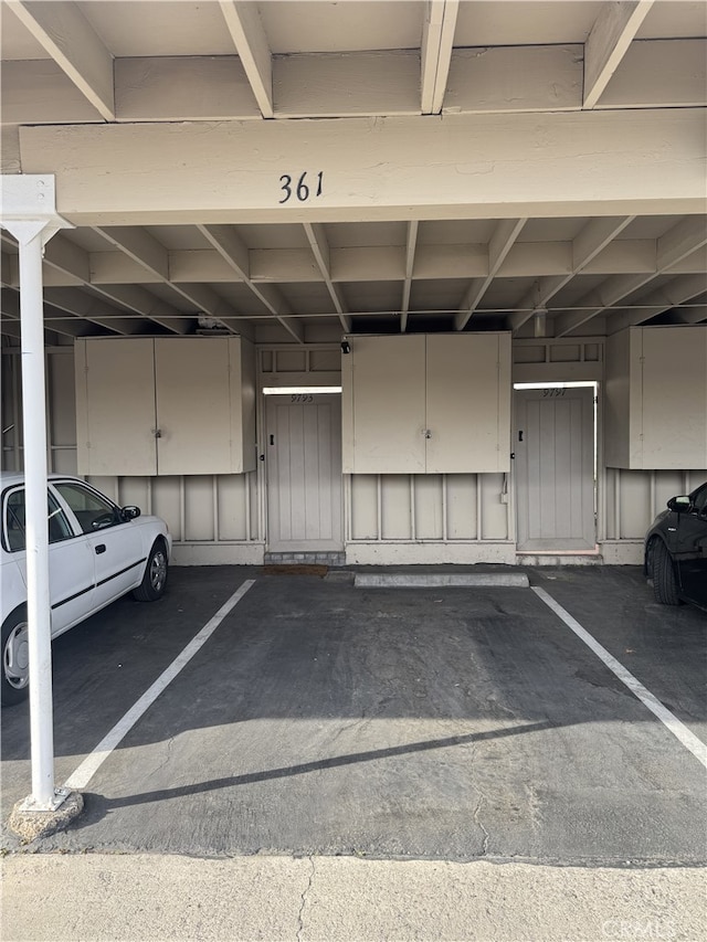 garage featuring covered parking