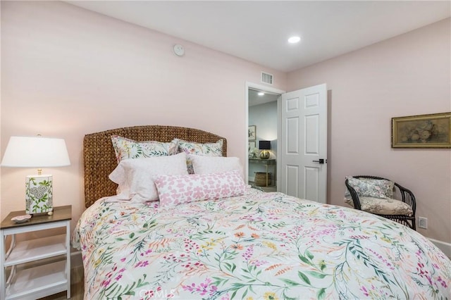 bedroom featuring recessed lighting and visible vents