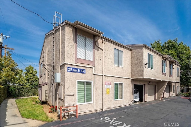 view of building exterior featuring a garage