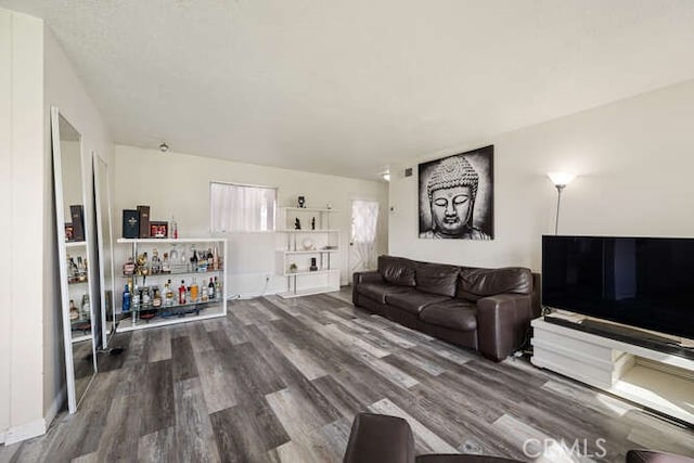 living area with wood finished floors