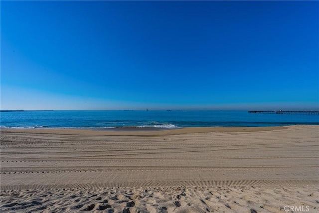 property view of water with a beach view