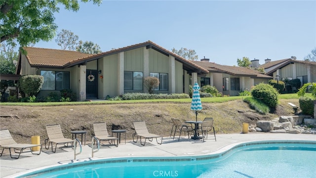 pool featuring a patio area