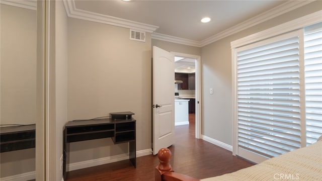 bedroom with visible vents, dark wood finished floors, recessed lighting, crown molding, and baseboards