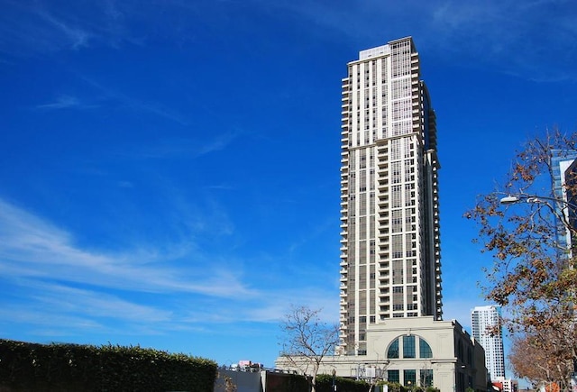 view of building exterior with a city view