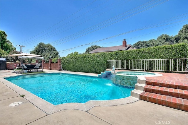 view of pool featuring a patio area, a fenced in pool, an in ground hot tub, and fence