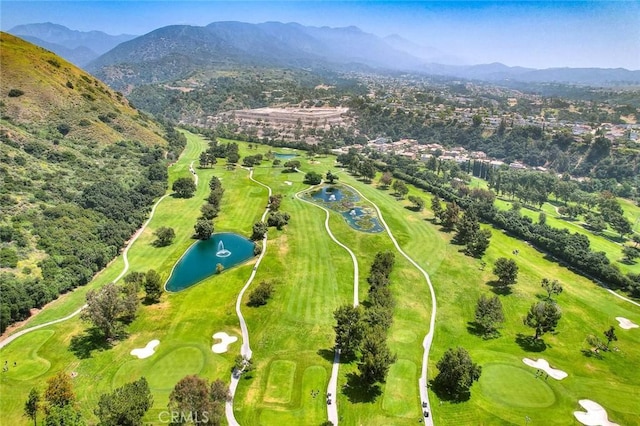 bird's eye view featuring a water and mountain view