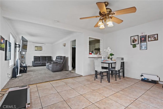 dining room featuring tile patterned floors and a ceiling fan