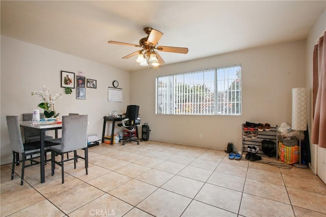 dining room featuring light tile patterned floors and ceiling fan