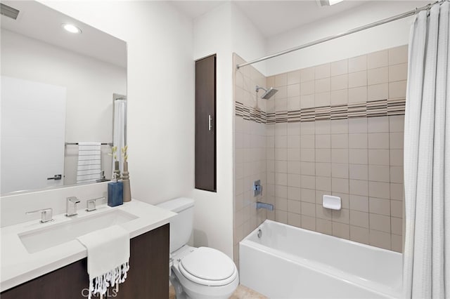 full bathroom featuring vanity, visible vents, recessed lighting, shower / bath combo with shower curtain, and toilet