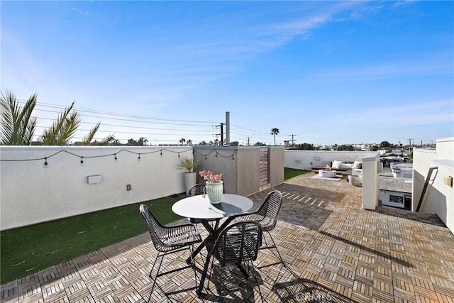 view of patio / terrace featuring an outdoor living space and outdoor dining space