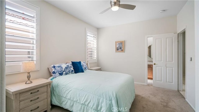 bedroom featuring light carpet, baseboards, and ceiling fan