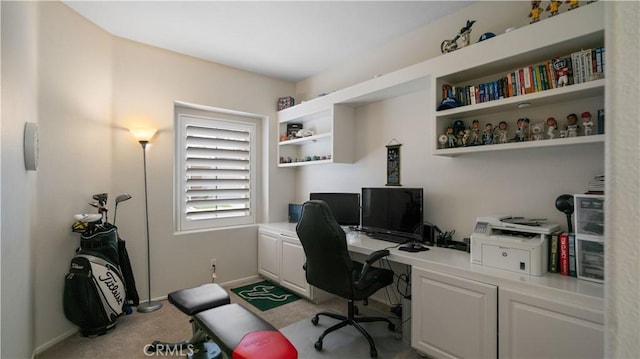 home office featuring baseboards and carpet flooring