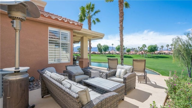 view of patio featuring a water view and an outdoor hangout area