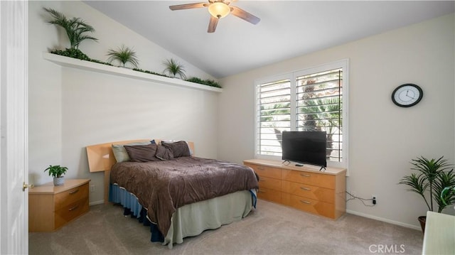 bedroom with light carpet, ceiling fan, and vaulted ceiling