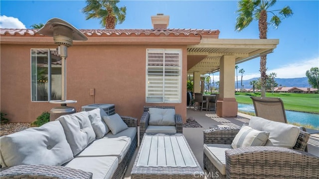 view of patio with central AC and outdoor lounge area