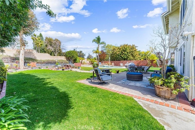 view of yard featuring a patio and fence