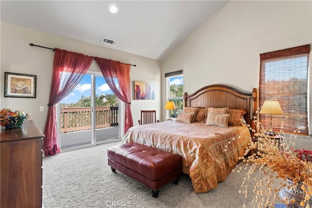 carpeted bedroom featuring access to exterior, visible vents, multiple windows, and high vaulted ceiling