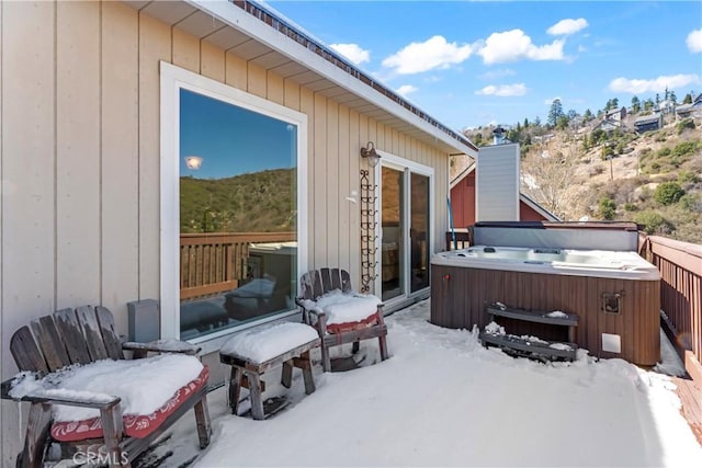 exterior space featuring a hot tub