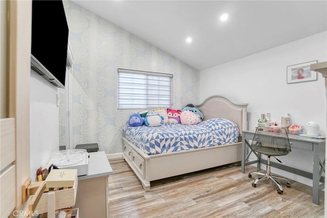 bedroom with recessed lighting, light wood-type flooring, baseboards, and vaulted ceiling