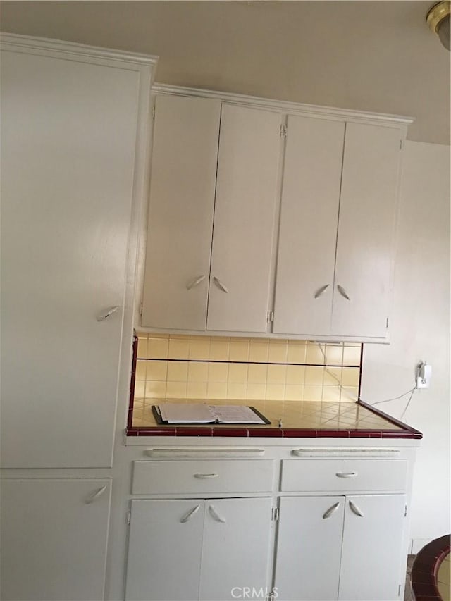 interior space featuring decorative backsplash