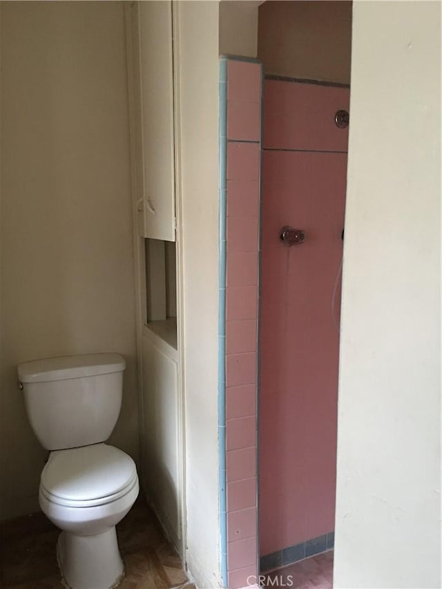 bathroom featuring toilet