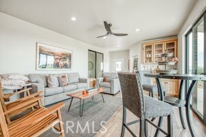 living room featuring a ceiling fan