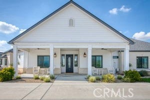 neoclassical / greek revival house with covered porch