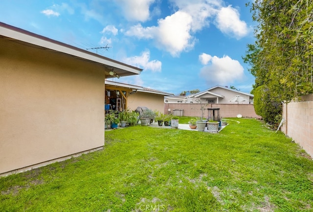 view of yard with fence