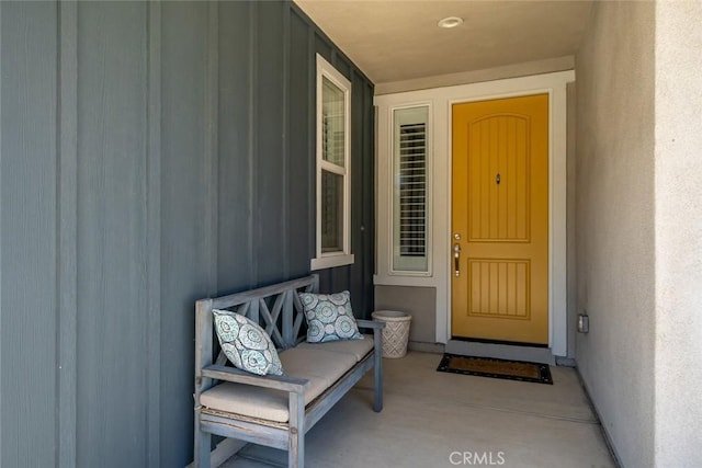 property entrance featuring stucco siding