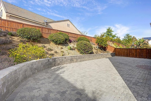 view of patio with a fenced backyard