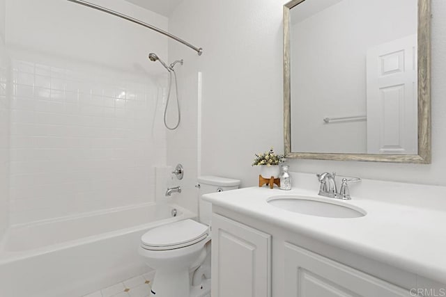 bathroom with vanity, toilet, and shower / tub combination