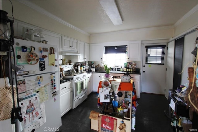 kitchen with under cabinet range hood, white cabinets, white appliances, and dark countertops