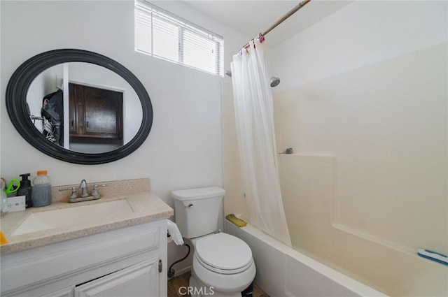 full bathroom with vanity, shower / bath combination with curtain, and toilet