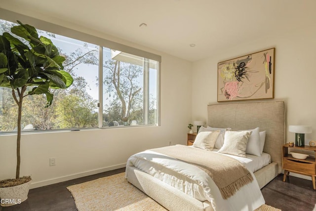 bedroom featuring baseboards