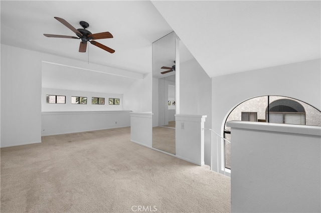 interior space with lofted ceiling and carpet