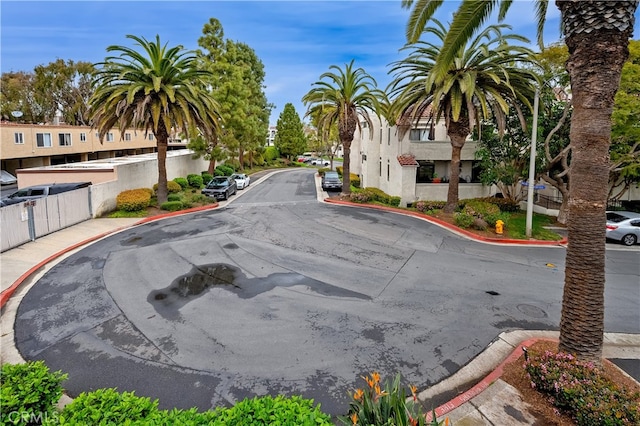 view of street featuring curbs