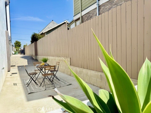 view of patio with fence