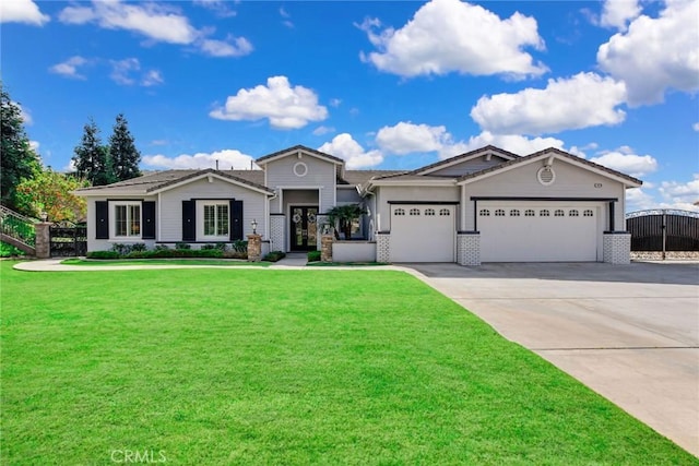 view of front of house with a gate, concrete driveway, a front lawn, a garage, and brick siding