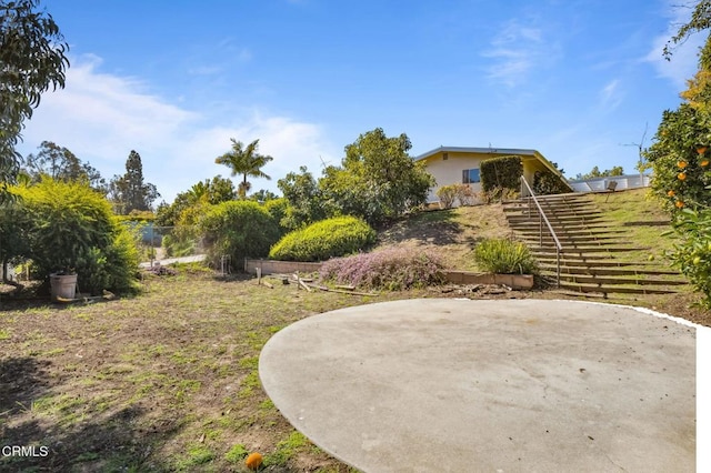 view of yard with a patio area and fence