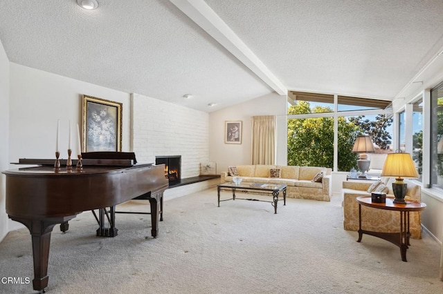 carpeted living area featuring a fireplace, vaulted ceiling with beams, and a textured ceiling