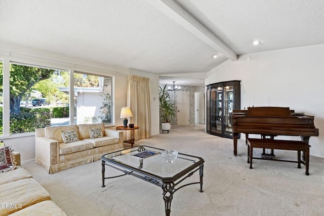 carpeted living area with a notable chandelier, vaulted ceiling with beams, and a textured ceiling