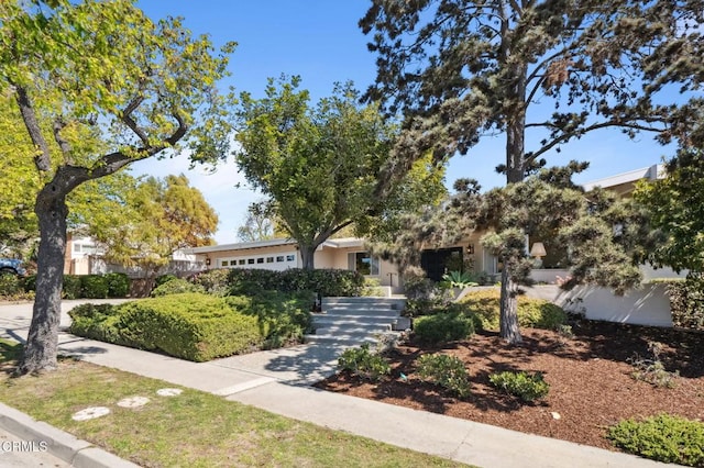 view of front of property featuring an attached garage