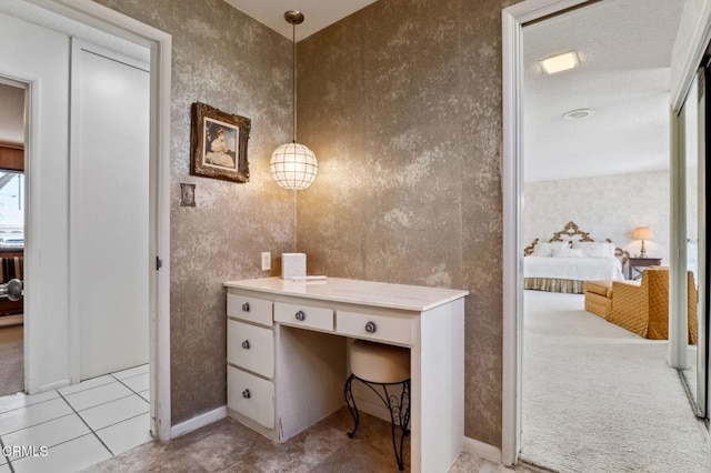 bathroom with tile patterned floors