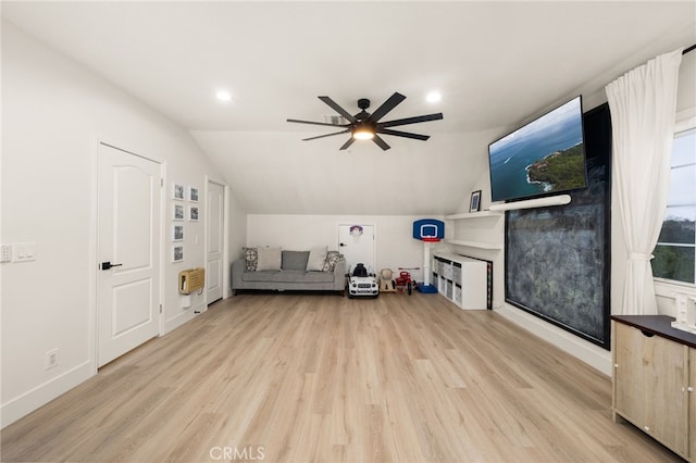 interior space featuring baseboards, ceiling fan, lofted ceiling, recessed lighting, and light wood-style floors