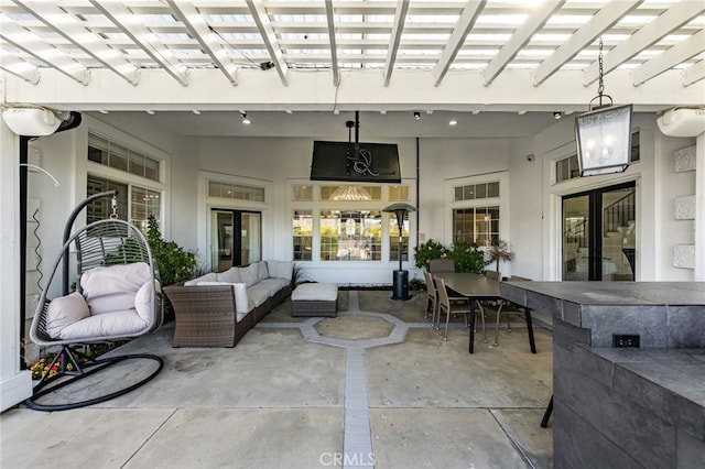 view of patio featuring an outdoor hangout area and a pergola