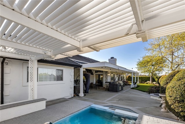 pool featuring a patio area