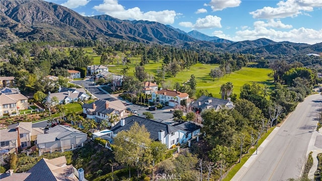 birds eye view of property featuring a mountain view and a residential view