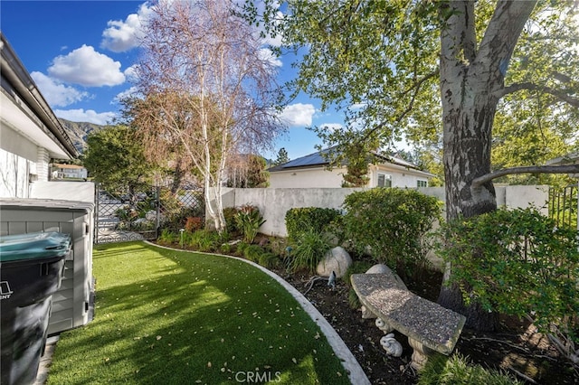 view of yard with fence