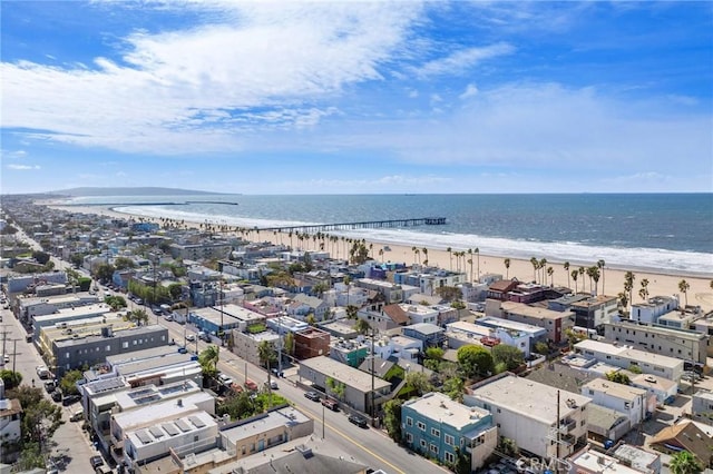 bird's eye view featuring a beach view and a water view