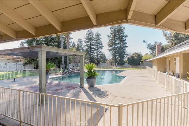 view of swimming pool with a patio area, a fenced in pool, and fence private yard